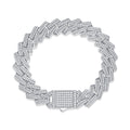 Silver bracelet with intricate design on a white background